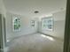 Well lit bedroom with three windows offering lots of natural light at 316 Firefly Overlook, Pittsboro, NC 27312