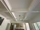 Detailed ceiling features a modern fan and geometric, coffered design adding architectural interest at 316 Firefly Overlook, Pittsboro, NC 27312