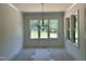 Dining room with a large picture window at 316 Firefly Overlook, Pittsboro, NC 27312