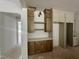 The kitchenette features custom cabinets, a stylish countertop, and modern lighting fixtures at 316 Firefly Overlook, Pittsboro, NC 27312