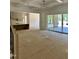 Living room with access to sun room and kitchen at 316 Firefly Overlook, Pittsboro, NC 27312