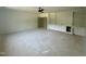 Spacious living room boasts built-in cabinets with display shelves providing storage and style at 316 Firefly Overlook, Pittsboro, NC 27312