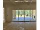 Sun room with sliding glass doors and fireplace at 316 Firefly Overlook, Pittsboro, NC 27312