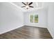 Spacious bedroom with wood-look floors and a ceiling fan at 21 Walnut Hall Ct, Selma, NC 27576