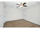 Spacious bedroom with ceiling fan and carpeted floor at 21 Walnut Hall Ct, Selma, NC 27576