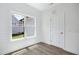 Bright office space with large window and wood-look floors at 21 Walnut Hall Ct, Selma, NC 27576