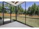 Spacious screened porch overlooking backyard at 21 Walnut Hall Ct, Selma, NC 27576