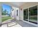 Covered back patio with white railings and siding, great for entertaining at 83 Artic Circle, Garner, NC 27529