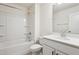 Clean, well-lit bathroom featuring a shower-tub combo and modern fixtures at 83 Artic Circle, Garner, NC 27529