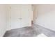 Neutral bedroom with soft carpet, closet, and bright window offering a pleasant view at 83 Artic Circle, Garner, NC 27529