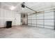 Spacious unfinished garage with ample room for storage and parking at 83 Artic Circle, Garner, NC 27529