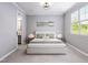 Bright bedroom with neutral decor and an ensuite bathroom at 154 Colonial Trail Ct, Pittsboro, NC 27312