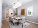Bright dining room featuring a modern chandelier and stylish decor at 154 Colonial Trail Ct, Pittsboro, NC 27312