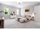 Bright and spacious main bedroom with carpet, perfect for relaxation and rest at 154 Colonial Trail Ct, Pittsboro, NC 27312