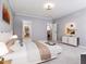 Spacious main bedroom with carpet and access to a walk-in closet at 154 Colonial Trail Ct, Pittsboro, NC 27312