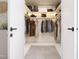 Walk-in Closet containing shelving and racks for optimal storage at 154 Colonial Trail Ct, Pittsboro, NC 27312