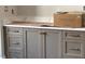 Close-up of vanity with gold hardware and white countertop at 8305 Society Pl, Raleigh, NC 27615