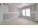 Spacious bedroom with a large window for ample light at 8305 Society Pl, Raleigh, NC 27615