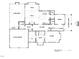 First-floor floor plan blueprint showcasing the living spaces, kitchen, Primary suite, and garage layout at 8305 Society Pl, Raleigh, NC 27615