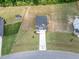 Aerial view of a well-maintained home with a large, green backyard at 176 Van Winkle St, Lillington, NC 27546