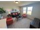 Bonus room with seating area and large windows at 176 Van Winkle St, Lillington, NC 27546