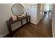 Bright entryway with wood-look floors and a console table at 176 Van Winkle St, Lillington, NC 27546