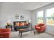 Cozy living room features natural light, comfortable seating, and stylish decor at 176 Van Winkle St, Lillington, NC 27546