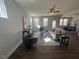 Spacious living room with hardwood floors and ample natural light at 176 Van Winkle St, Lillington, NC 27546