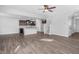 Open floor plan with hardwood floors and kitchen island at 176 Van Winkle St, Lillington, NC 27546
