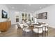 Bright dining area showcases modern decor, and a sun-filled window offering a cozy atmosphere at 4015 Elk Creek Ln, Raleigh, NC 27612