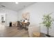 Bright home office featuring light wood floors, modern furnishings, and ample natural light at 4015 Elk Creek Ln, Raleigh, NC 27612