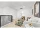 Modern loft space featuring a comfortable seating area, stylish decor, and neutral tones at 4015 Elk Creek Ln, Raleigh, NC 27612