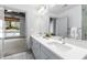 Bathroom with double vanity, lots of counter space, and modern finishes at 1300 St Marys St # 208, Raleigh, NC 27605