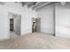 Spacious bedroom with carpet flooring and views of the kitchen and closet at 1300 St Marys St # 208, Raleigh, NC 27605