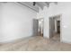 Spacious carpeted bedroom with grey trim and two open doors, plenty of room to move around at 1300 St Marys St # 208, Raleigh, NC 27605