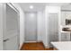Bright entryway boasts hardwood floors, a closet, and a neutral color palette at 1300 St Marys St # 208, Raleigh, NC 27605