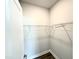 Walk-in closet with neutral gray flooring and wire shelving at 122 Southern Estates Dr, Sanford, NC 27330