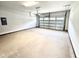 Spacious and clean two-car garage with a white door and overhead lighting at 122 Southern Estates Dr, Sanford, NC 27330
