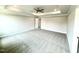 Large main bedroom offering plush carpet, tray ceiling, and great natural light at 122 Southern Estates Dr, Sanford, NC 27330