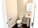 Elegant powder room featuring a pedestal sink and modern fixtures at 122 Southern Estates Dr, Sanford, NC 27330