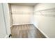 Spacious walk-in closet with carpet floors and wire shelving for storage at 122 Southern Estates Dr, Sanford, NC 27330