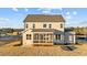 Two story home with screened porch and landscaped yard at 130 Summerlin Dr, Clayton, NC 27527