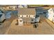 Aerial view of a new home with screened porch and landscaped yard at 130 Summerlin Dr, Clayton, NC 27527