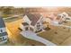 Aerial view of a new two story home with attached garage at 130 Summerlin Dr, Clayton, NC 27527