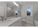 Elegant bathroom with double vanity, marble countertop, and large tiled shower at 130 Summerlin Dr, Clayton, NC 27527