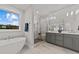 Modern bathroom with soaking tub and walk-in shower at 130 Summerlin Dr, Clayton, NC 27527