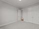 Spacious bedroom with neutral decor and double doors at 130 Summerlin Dr, Clayton, NC 27527