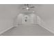 Spacious bonus room with two entrances and ceiling fan at 130 Summerlin Dr, Clayton, NC 27527