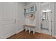 Inviting entryway with bench, cubbies, and coat hooks at 130 Summerlin Dr, Clayton, NC 27527
