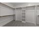 Large walk-in closet with ample shelving and hanging space at 130 Summerlin Dr, Clayton, NC 27527